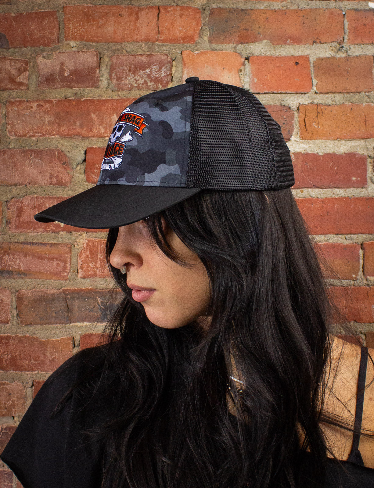 Black Shag Vintage Embroidered Skull + Crossbones Camo Trucker Hat