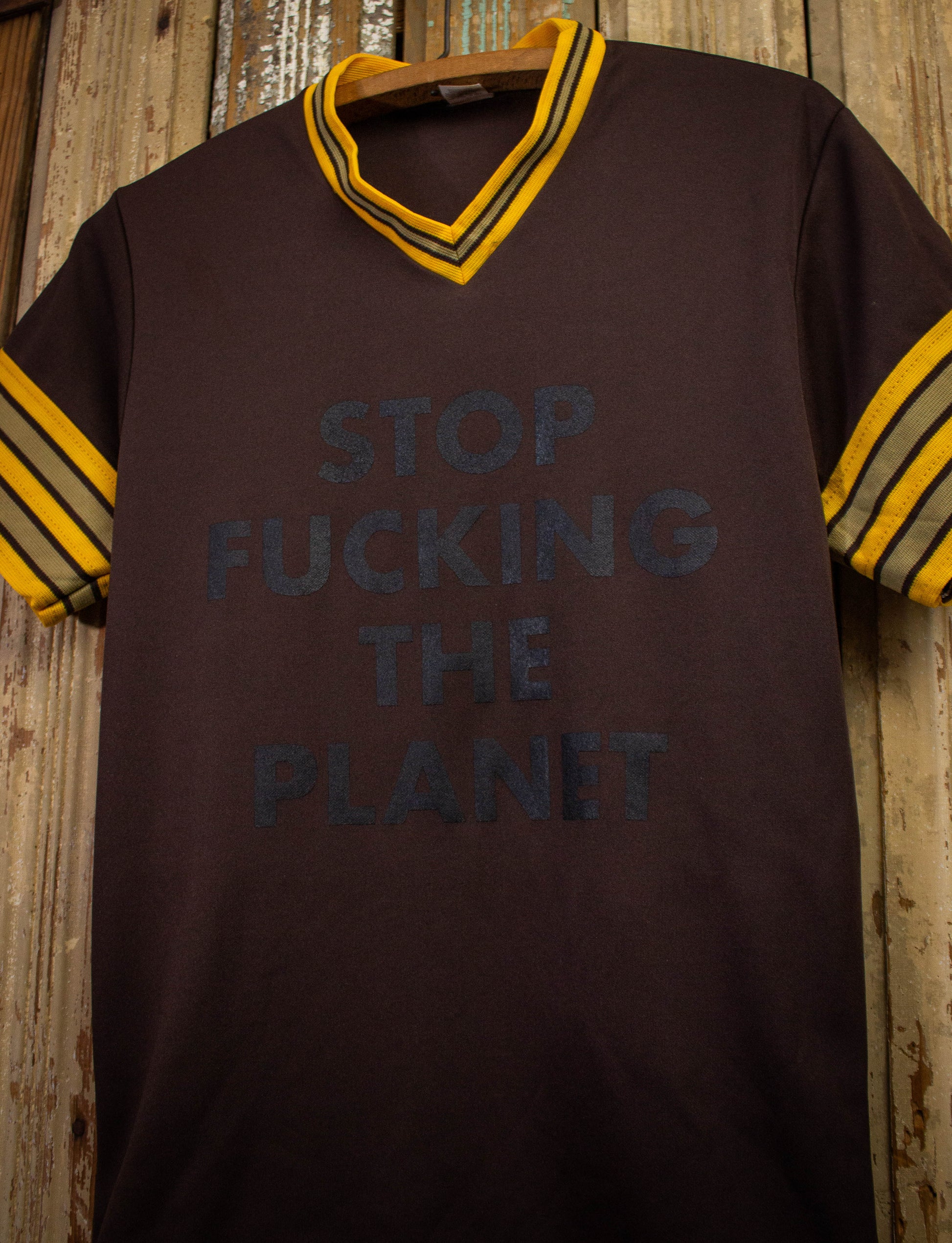 Stop Fucking The Planet Jersey Graphic T Shirt Brown and Yellow Small