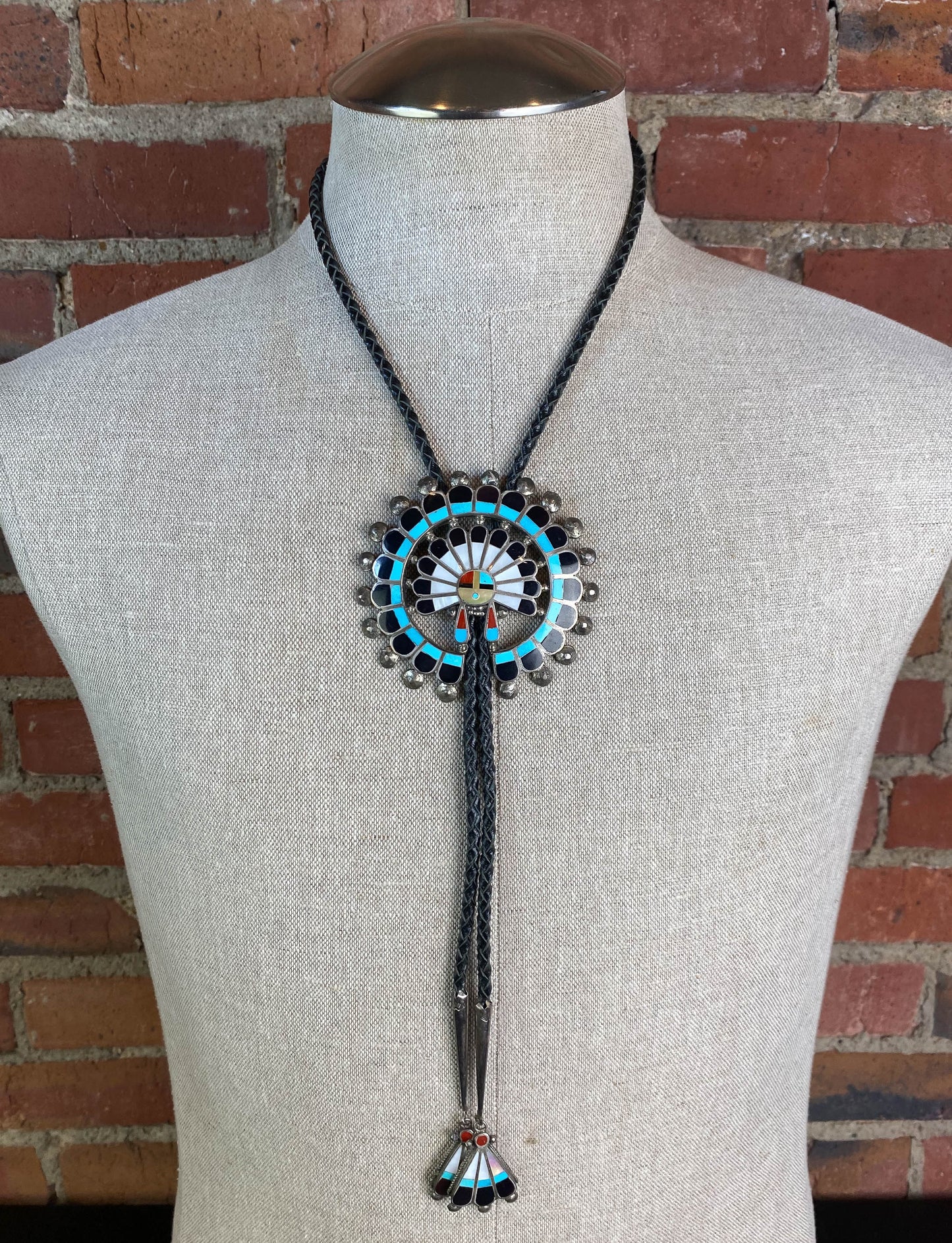 Vintage 70's Zuni Inlay Sunface Bolo Tie Sterling Silver Turquoise Coral Mother of Pearl Braided Black Leather Unisex