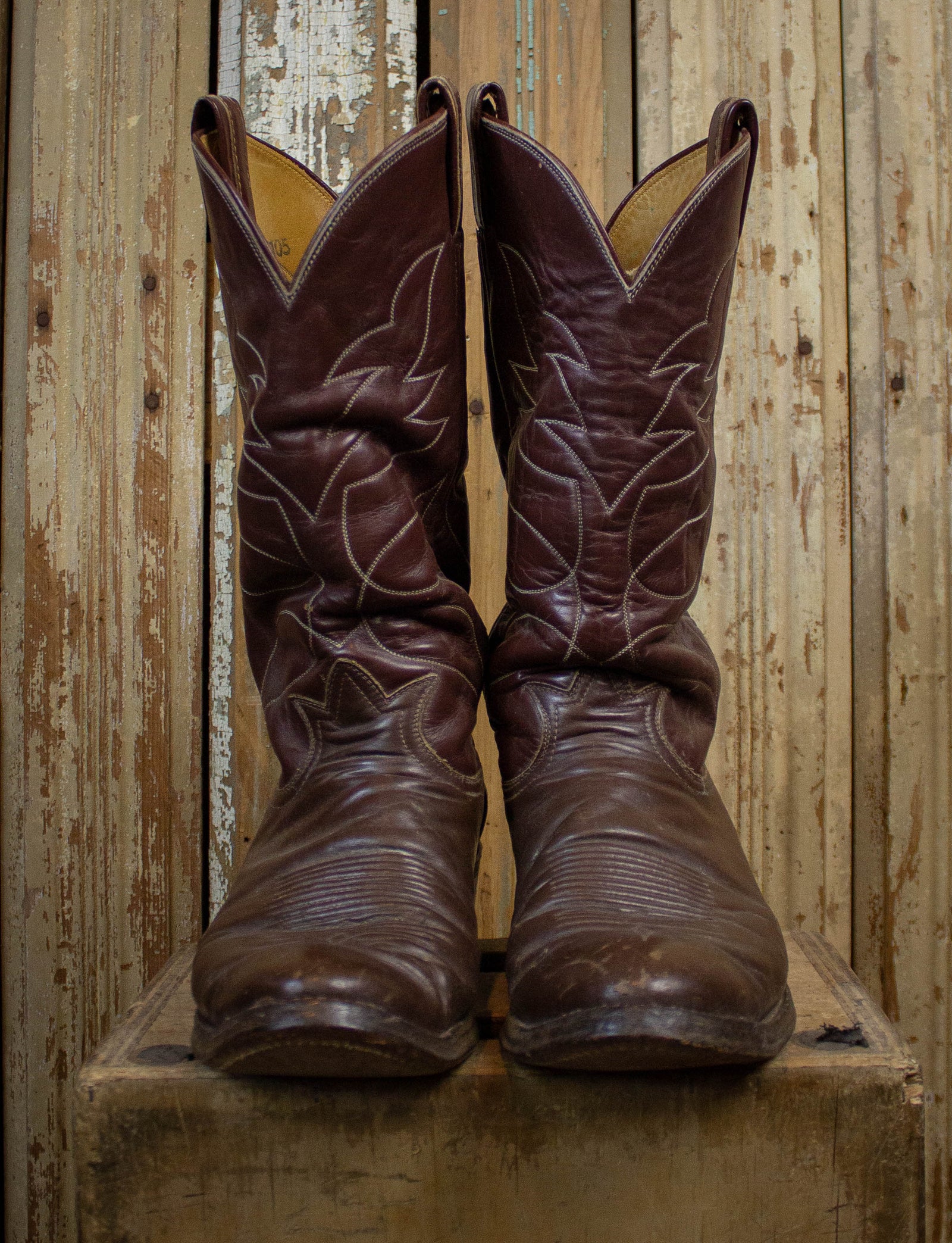 Used Western Boots with 10 top, red bottoms with